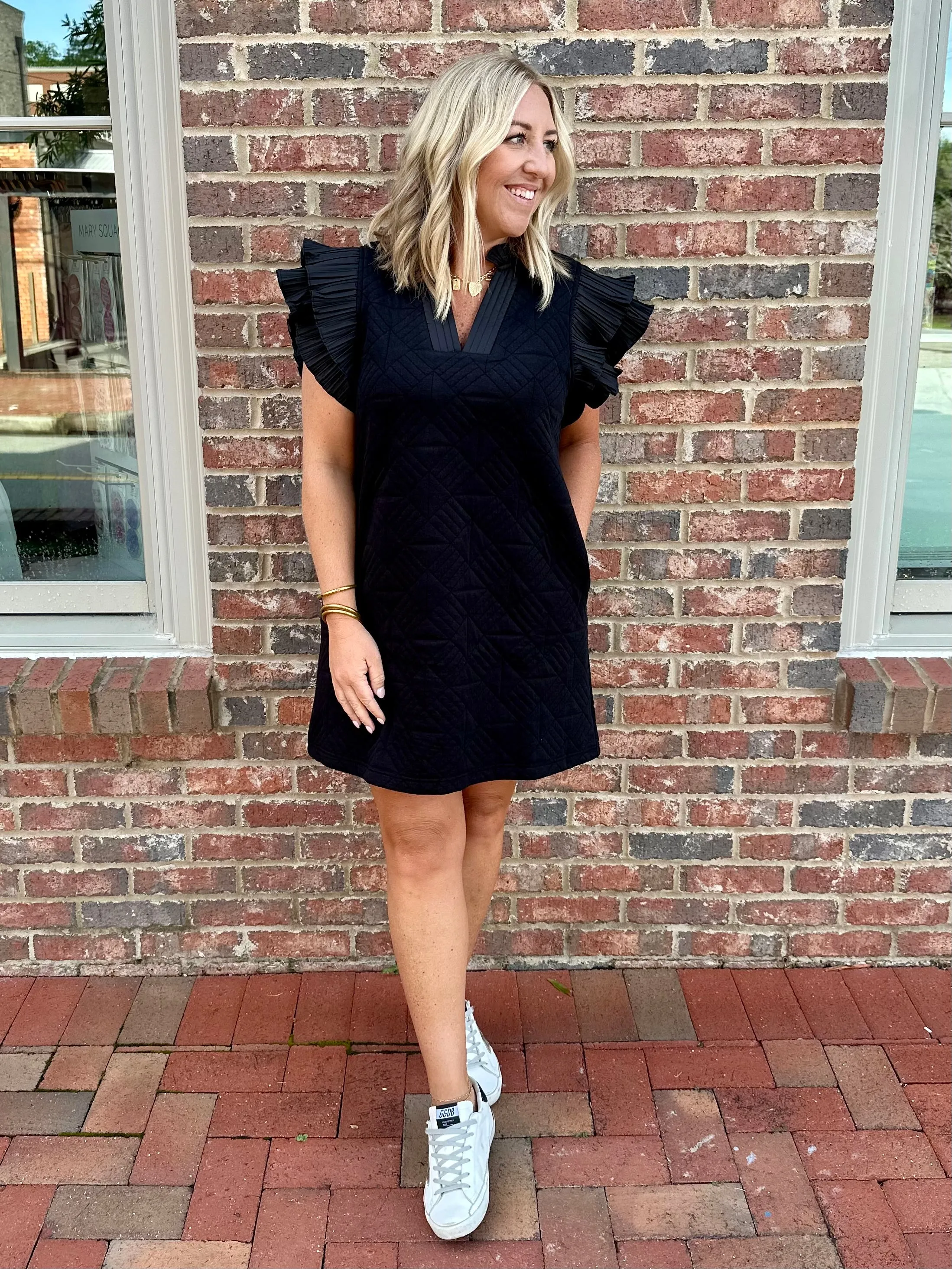 Blind Sided Textured Dress with Ruffled Sleeve- Black