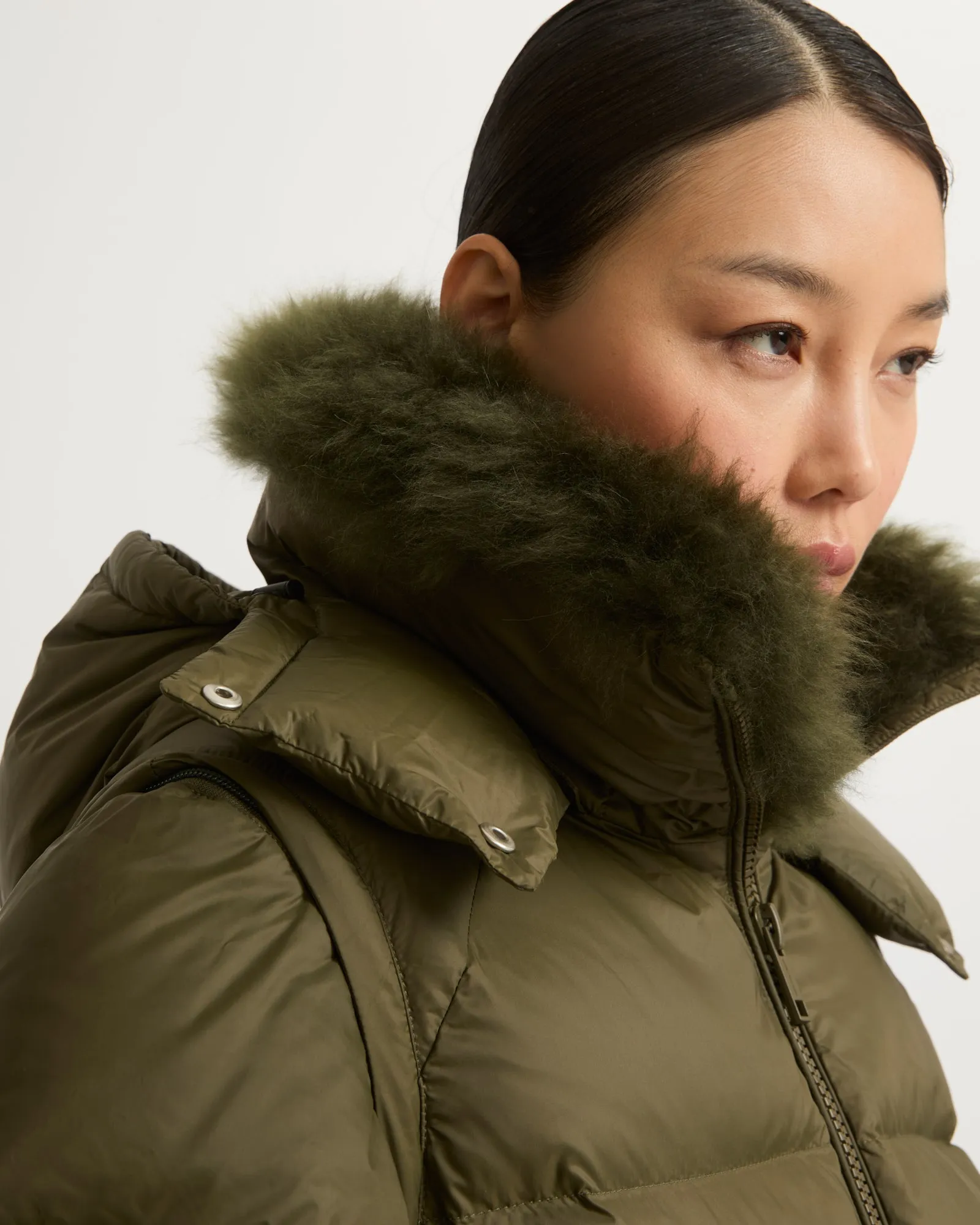 Long down jacket in water-repellent technical fabric with collar trim in fluffy lambswool